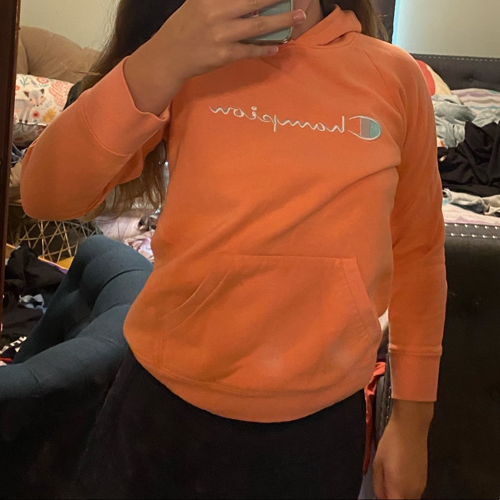 A peach champion hoodie! Size XL in kids:)
